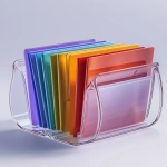 **Isolated product photo of a transparent acrylic file organizer holding colored folders, placed on a neutral background with soft drop shadow, camera at 45-degree angle, ultra-sharp edges and clear material rendering, minimal reflections, --ar 4:5 --v 6.1 --quality 2 --raw** - Upscaled (Creative) by <@1145244586088861708> (relaxed)