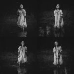 **a black and white photo-realism of a young girl, in ragged white dress, and heavy, dark makeup. she is standing in ankle deep water, looking upwards and grinning. eerie, unsettling.** - Variations (Strong) by <@376196082390138880> (fast)
