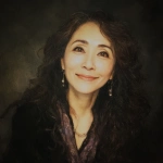 **Yoshiko, a Japanese woman in her mid-50s. She has long, wavy hair and strikingly large eyes, smiling with a deep gaze. She has a slightly plump figure. Portrait. Oil painting style. --v 7.0** - Image #2 <@1105655477741813870>